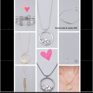 Swarovski accessories silver color.
